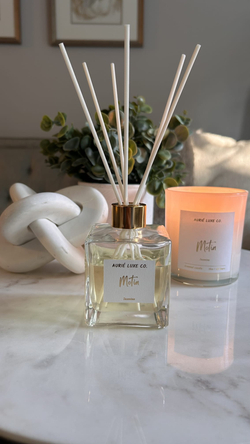 Where Elegance Meets Essence: Candle & Diffuser Set